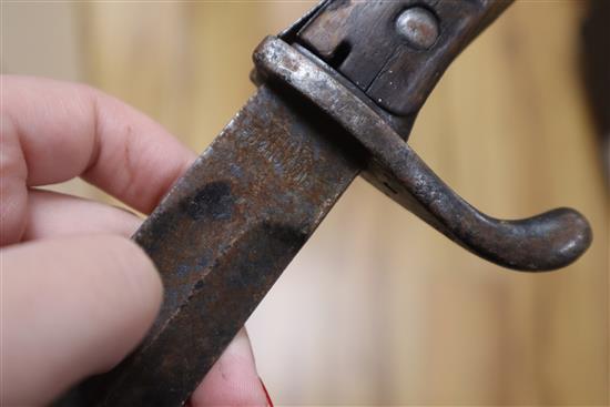 A kukri and a bayonet